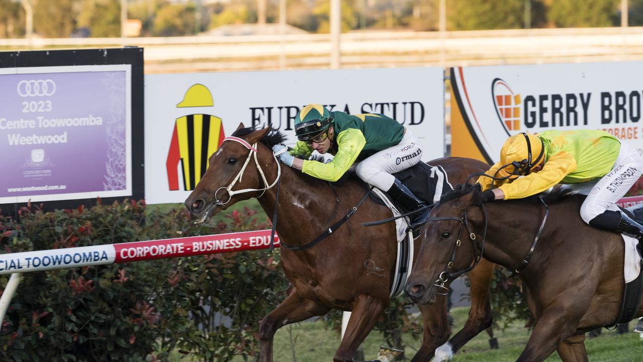 Yellow Brick (inside) places second to All That Pizzazz in the Weetwood Handicap on 2023 Audi Centre Toowoomba Weetwood race day at Clifford Park Racecourse. Picture: Kevin Farmer