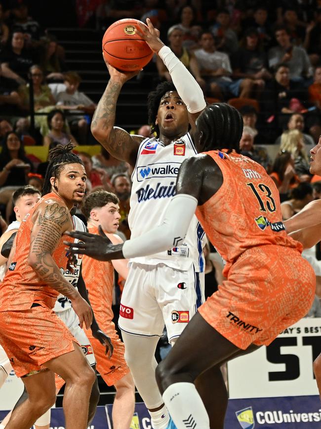 CAIRNS, AUSTRALIA - SEPTEMBER 28: Kendric Davis of the 36ers shoots under pressure during the round two NBL match between Cairns Taipans and Adelaide 36ers at Cairns Convention Centre, on September 28, 2024, in Cairns, Australia. (Photo by Emily Barker/Getty Images)