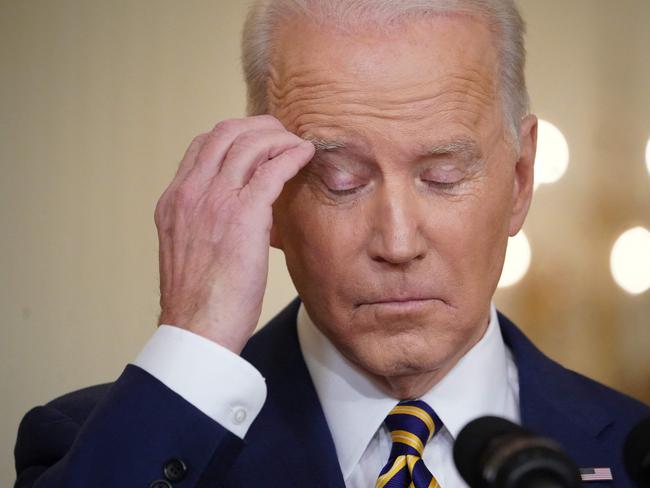 US President Joe Biden gestures during a news conference in the East Room of the White House, on January 19, 2022, in Washington, DC. - President Joe Biden holds a rare press conference Wednesday to kick off his second year in office, hoping to reset the agenda ahead of what could be brutal election reversals for Democrats. (Photo by MANDEL NGAN / AFP)