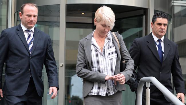 Detectives involved in the case leave court after the pedophile father was jailed for more than 22 years. Picture: Justin Benson-Cooper