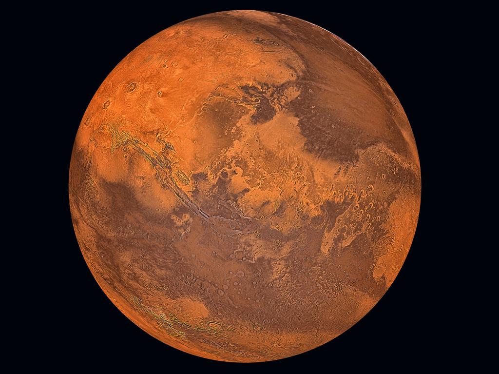 Mars is easy to spot with the naked eye on a clear night, thanks to its distinctive orange glow. Picture: supplied