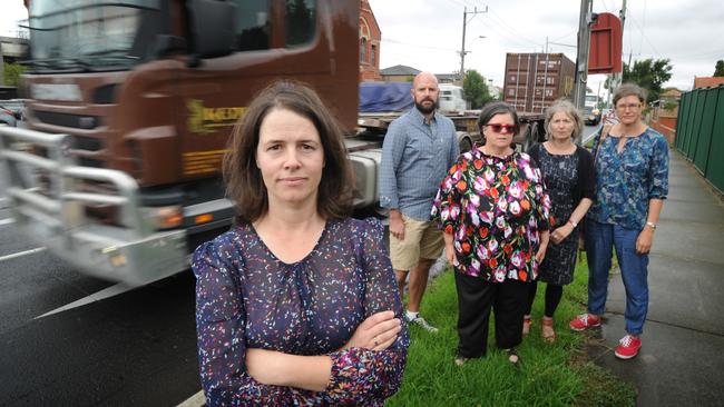 Samantha McArthur, Scott Ellerton, Colleen Hartland, Christine McCall and Naomi Shadwick are demanding all port trucks must be prohibited from using local streets. Picture: Andrew Henshaw