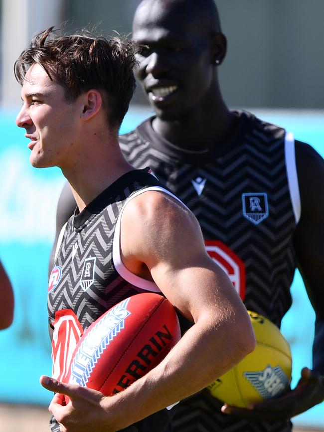 Rozee and Aliir Aliir hit the training paddock.