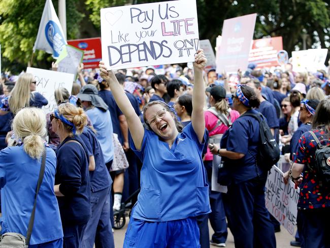 SYDNEY, AUSTRALIA - NewsWire Photos SEPTEMBER 24 , 2024:   Nurse Caitlyn Moore   gathers with nurses in Hyde Park as Nurses and Midwives march to State parliament as part of their 24 hour strike to demand better pay and for the the NSW government to better value their professions.Picture: NewsWire / John Appleyard