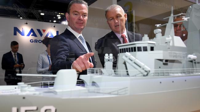 The then minister for defence industry, Christopher Pyne, left, inspects a scale model of an Anzac-class frigate as he tours the stand of CEA Technologies, which has supplied radar, at the Pacific 2017 International Maritime Exposition in Sydney. Picture: AAP