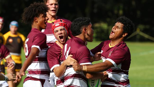 Kadin Pritchard, left, celebrates a try. Picture: Tertius Pickard