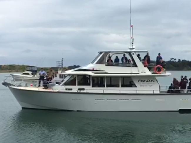 The shore at Whakatane, New Zealand, where relatives and friends of the White Island volcano victims heading off towards the island on a boat as authorities attempt to retrieve the bodies of 8 victims. Source: Matthew Benns