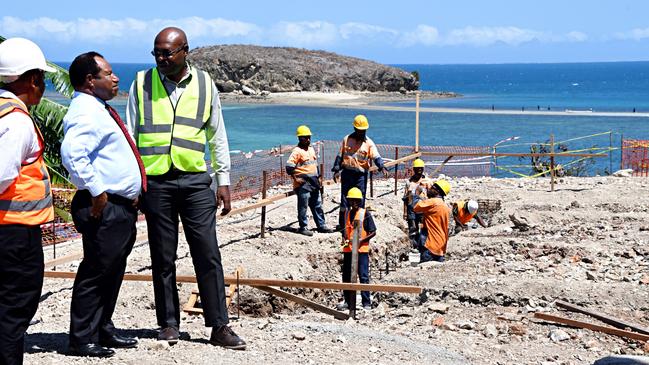 Public Enterprise and State Investments Minister William Duma (second left) visiting the Coral Sea Cable System landing site in Port Moresby. While Canberra is funding the 4000km cable connecting PNG, the Solomons and Australia, the Chinese company Huawei will distribute the internet in Papua New Guinea. Picture: Post Courier