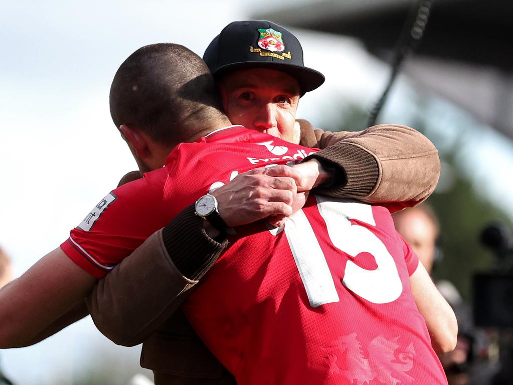 Rob McElhenney hugs Eoghan O'Connell of Wrexham after their victory. Picture: Jan Kruger/Getty Images