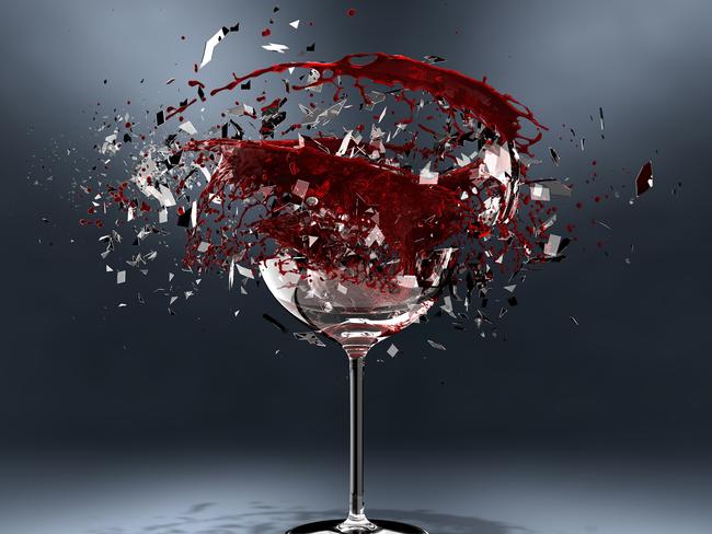 Explosion of a glass with red wine.