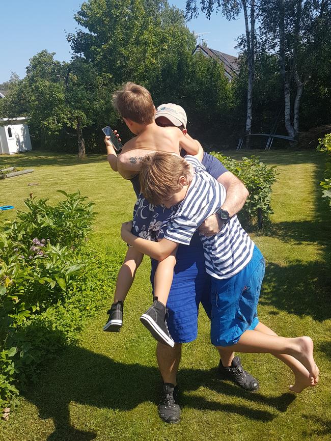 Playtime... Adam with his children in Sweden.