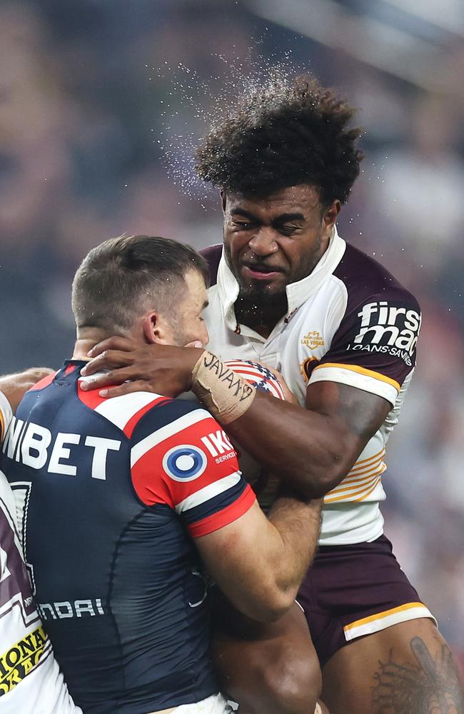 James Tedesco and Ezra Mam come together in the air. Picture: Ezra Shaw/Getty Images