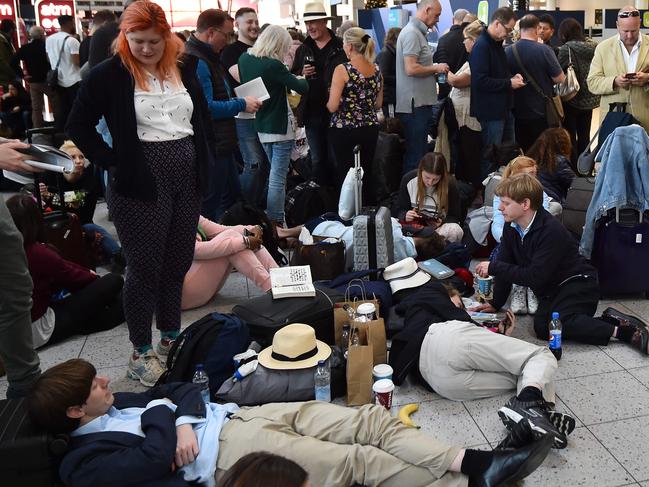 Stranded passengers wait at London Gatwick Airport on December 20 after all flights were grounded due to drones flying over the airfield. Picture: Glyn Kirk/AFP