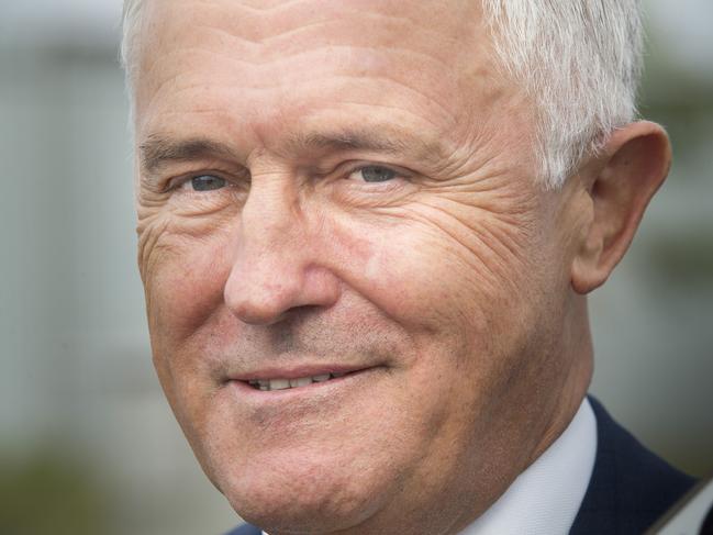 Daily Telegraph - Pictured: Malcolm Turnbull smiles to media - Prime Minister Malcolm Turnbull and Defence Minister Marise Payne visited Holsworthy Army Barracks today. Photographs taken in the car park outside of the base.