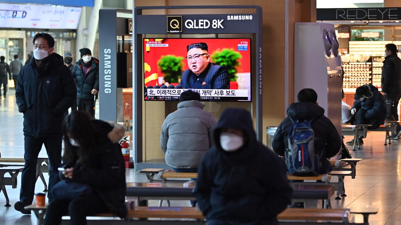 People in Seoul watch a television screen showing news footage of North Korean leader Kim Jong-un. Picture: Jung Yeon-je/AFP