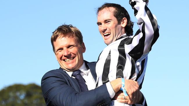 SYDNEY, AUSTRALIA - OCTOBER 26: Trainer Bjorn Baker celebrates after Tyler Schiller riding Belclare wins Race 8 The Invitation during "Spring Champion Stakes Day" Sydney Racing at Royal Randwick Racecourse on October 26, 2024 in Sydney, Australia. (Photo by Jeremy Ng/Getty Images)