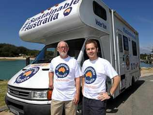 Ronald McDonald and William Bourke from the Sustainable Australia Party, pose for a photograph in front of their Voter Van at Kingscliff. Picture: Scott Davis