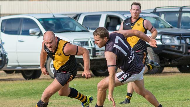 Kimba's Joel Fitzgerald and Ports Nathan Hannemann battle for possession at Arno Bay.