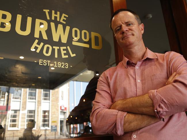 Campbell McConachie poses for a photo at the Burwood Hotel today, October 5, 2017. Campbell has written a book called the Fatalist about discovering his drinking buddy at the Burwood Hotel was a murderer. (AAP Image/David Swift)