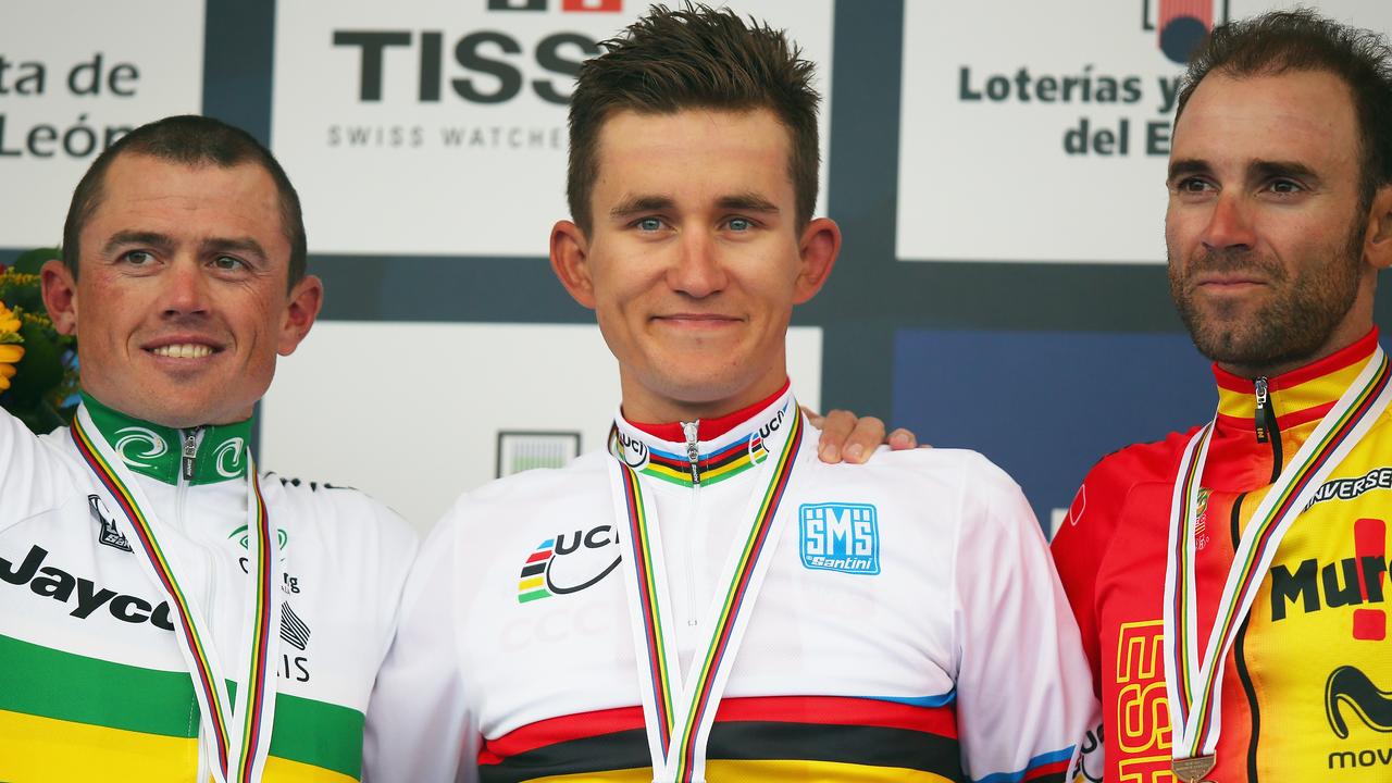 PONFERRADA, SPAIN - SEPTEMBER 28: (l to r) Simon Gerrans (2nd) of Australia, Michal Kwiatkowski (1st) of Poland and Alejandro Valverde (3rd) of Spain stand on the podium after the Elite Men's Road Race on day seven of the UCI Road World Championships on September 28, 2014 in Ponferrada, Spain. (Photo by Bryn Lennon/Getty Images)