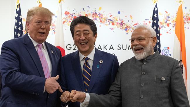 Donald Trump enjoys a light-hearted exchange with Shinzo Abe and Narendra Modi, the most important figures in the Indo-Pacific, during the G20 summit in Osaka in 2019. Picture: Getty Images