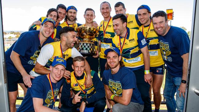 Eagles players celebrating with the premiership cup. Picture Matt Turner.