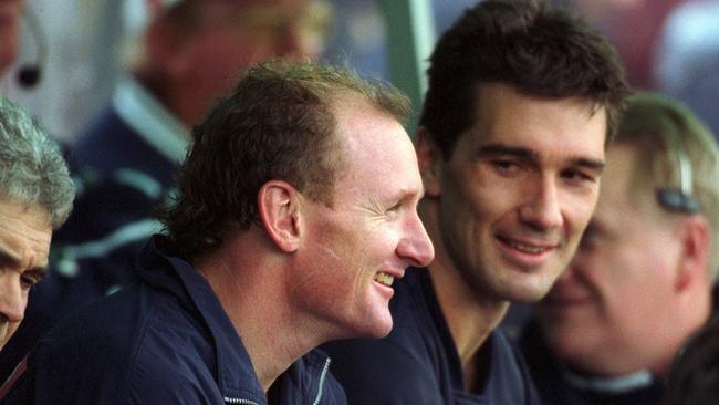 Craig Bradley and Stephen Silvagni on the bench together during the 2001 season.