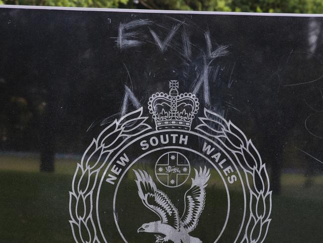 SYDNEY, AUSTRALIA : NewsWire Photos - JANUARY 27 2025; An investigation has been launched after the words ÃdogsÃ and ÃevilÃ were scribbled on a police monument was damaged in SydneyÃs Domain. The NSW Police Wall of Remembrance, dedicated to the memory of police officers killed in the line of duty, was significantly damaged by vandalism about 3.15am on Saturday. On Sunday, officers deployed as part of Australia Day celebrations, saw the damage and commenced an investigation. A crime scene has been established, which will be forensically examined by specialist police. Picture: NewsWire/ Gaye Gerard