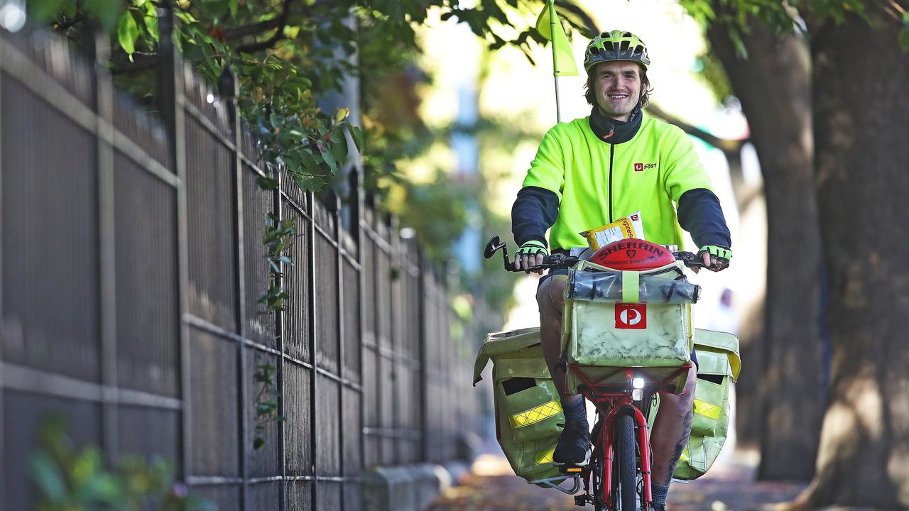 Posties are working harder and take pride in getting all deliveries done, despite working through breaks, their union says. Picture: Zak Simmonds.