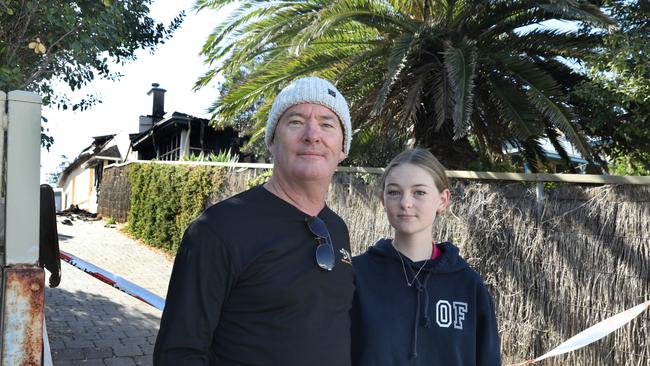 Terry McAssey and his daughter, Mackinley, 14, are neighbours to the property. Picture: Dean Martin