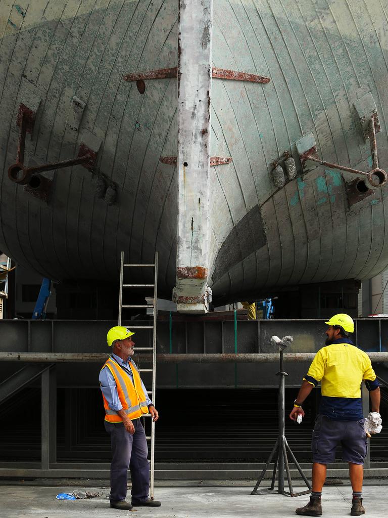 Endeavour dry dock in progress Ð Captain John Dikkenberg with Cody Horgan, Maritime Museum Shipwright. Endeavour undergoing renovations at the Sydney City Marine dry dock in Rozelle, under the ANZAC bridge.