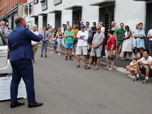 SUNDAY TELEGRAPH. FEBRUARY 17, 2024.Pictured is Auctioneer Ricky Briggs during an auction at 4 Water St, Annandale today. Picture: Tim hunter.