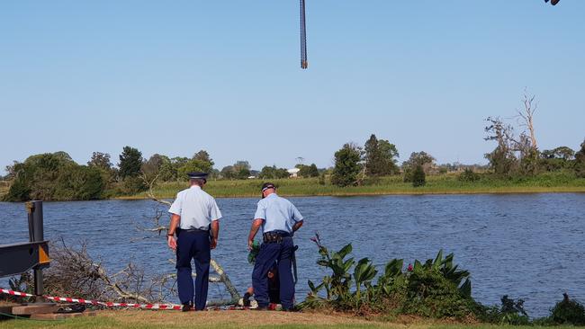 The bodies of a man and woman have been removed from the sedan. Picture: Frank Redwood