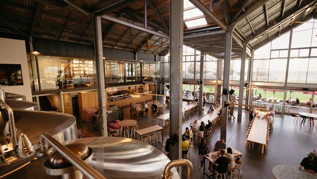 Across the road is the impossible-to-miss Shelter, a hangar-like brewery, restaurant and occasional concert venue. Picture: Supplied.