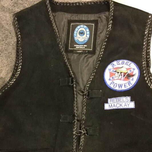 A Rebels jacket found by police during raids on Mackay bikies.