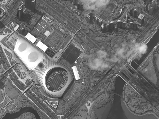 This satellite image appears to show Chinese security force vehicles inside the Shenzen Bay Sports Centre,. Picture: AP