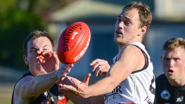 Tea Tree Gully’s Blake Penney and Rostrevor OC’s James Butterworth battle for the ball in last year’s division one grand final. Picture: AAP/Brenton Edwards