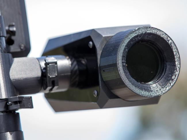 A HI-TECH camera which can detect people using their mobile phones while driving is being used in a demonstration in Melbourne. Alex McCredie with the camera. Picture: Mark Stewart