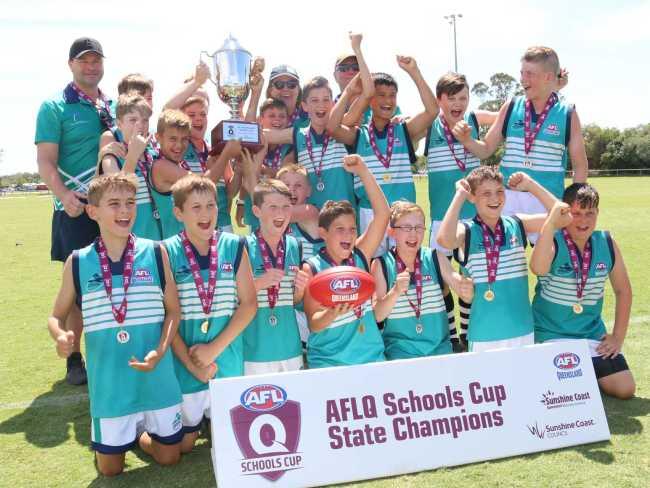 Eatons Hill celebrate their underdog win  in the primary boys division of the AFLQ School Cup.  Picture: Tom Threadingham