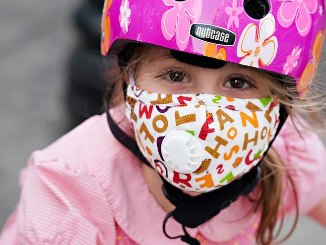 NEW YORK, NEW YORK - MAY 15:  A child wearing a protective mask waits outside Lenox Hill Hospital to show gratitude to the medical staff during the coronavirus pandemic on May 15, 2020 in New York City. COVID-19 has spread to most countries around the world, claiming over 308,000 lives with over 4.6 million infections reported. (Photo by Cindy Ord/Getty Images)