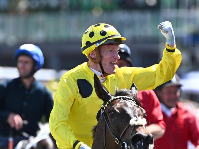 MELBOURNE, AUSTRALIA - NOVEMBER 07: Mark Zahra riding Without a Fight wins the Lexus Melbourne Cup during Melbourne Cup Day at Flemington Racecourse on November 07, 2023 in Melbourne, Australia. (Photo by Quinn Rooney/Getty Images)