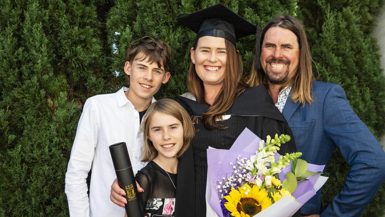 South Burnett Regional Council Cr Kirstie Schumacher celebrates her Bachelor of Communication and Media with son Decklan, daughter Grace and husband Wayne Schumacher at a UniSQ graduation ceremony at Empire Theatres. Picture: Kevin Farmer