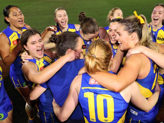 PERTH, AUSTRALIA - AUGUST 30: Daisy Pearce, Senior Coach of the Eagles celebrates with her players after winning the round one AFLW match between West Coast Eagles and Richmond Tigers at Mineral Resources Park, on August 30, 2024, in Perth, Australia. (Photo by Paul Kane/AFL Photos/via Getty Images)