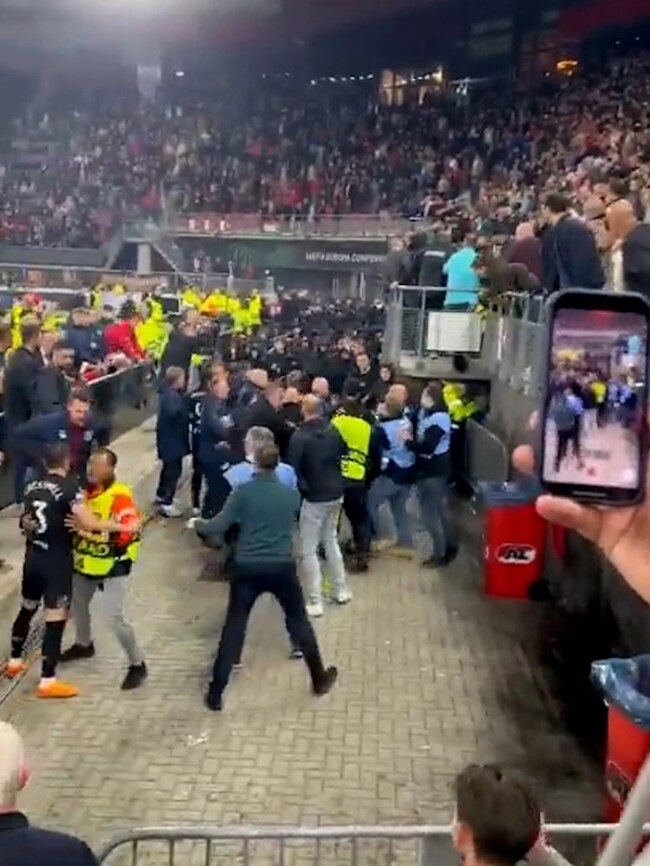 The Dutch club's thugs lined up to invade the area of seating used by the West Ham Players' families. Photo: Twitter.