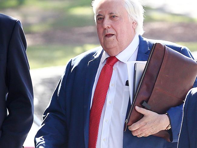 Businessman Clive Palmer arrives to the District Court in Brisbane, Thursday, July 25, 2019. Liquidators are trying to claw back $200 million in claims owed by Mr Palmer over the collapse of Queensland Nickel. (AAP Image/Jono Searle)