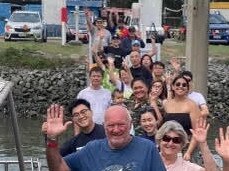 Tourists and residents lining up at Carter's Basin at The Spit on the Gold Coast for the Fishermen's Co-op sale of seafood to the public.