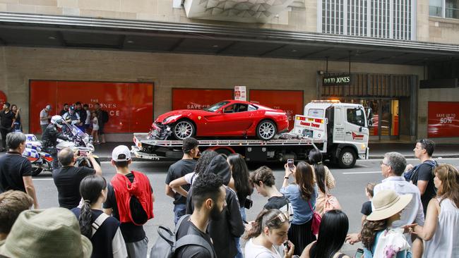 Crowds gather to get shots of the crash. Photo: Tim Pascoe