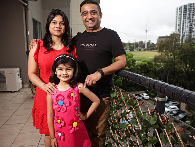 DAILY TELEGRAPH SEPEMBER 28, 2023. (LR) Kiran Maheshwari, Anaya Maheshwari (6) and Umesh Maheshwari at their home in Westmead that they are selling so they can upsize to a house in the same area. Picture: Adam Yip