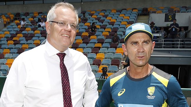 Scott Morrison speaks with then Australia coach Justin Langer, coach of Australia, in 2019. (Photo by Ryan Pierse/Getty Images)