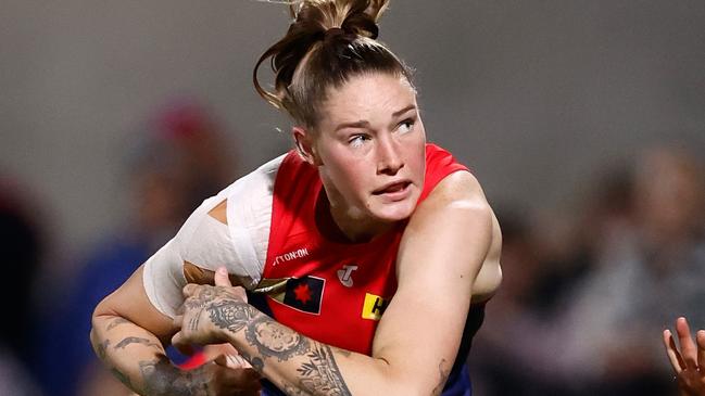 MELBOURNE, AUSTRALIA - SEPTEMBER 01: Tayla Harris of the Demons kicks the ball during the 2023 AFLW Round 01 match between the Melbourne Demons and the Collingwood Magpies at IKON Park on September 01, 2023 in Melbourne, Australia. (Photo by Michael Willson/AFL Photos via Getty Images)